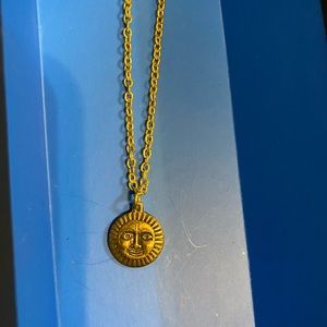 Sun face necklace